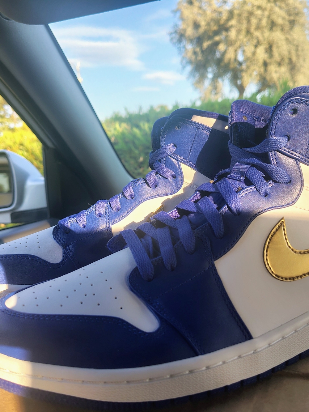 Nike Jordans High-Top Sneakers in Blue, White with Gold Swoosh